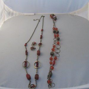 Necklaces and earrings left one is rust w/matching earrings